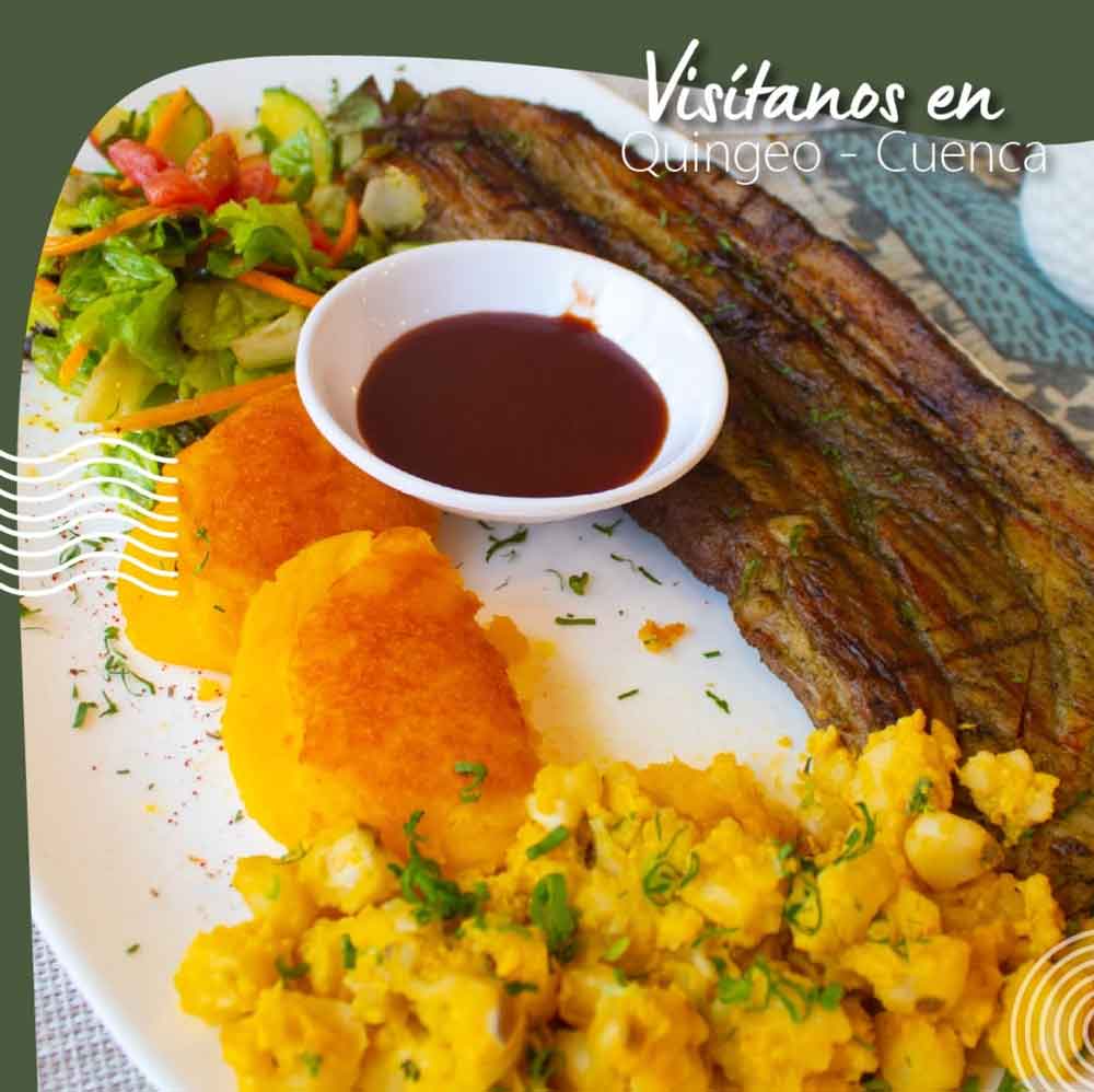 Plato de pescado con papas y ensalada